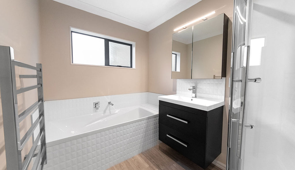 Adding stylish design and plenty of storage to a small bathroom in Tauranga