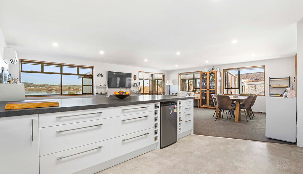 Open-Plan Interior Renovation Captures Lakeside Views in Huntly, Waikato