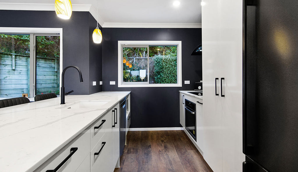 Eye-catching features and a splash of colour transform this previously tired kitchen